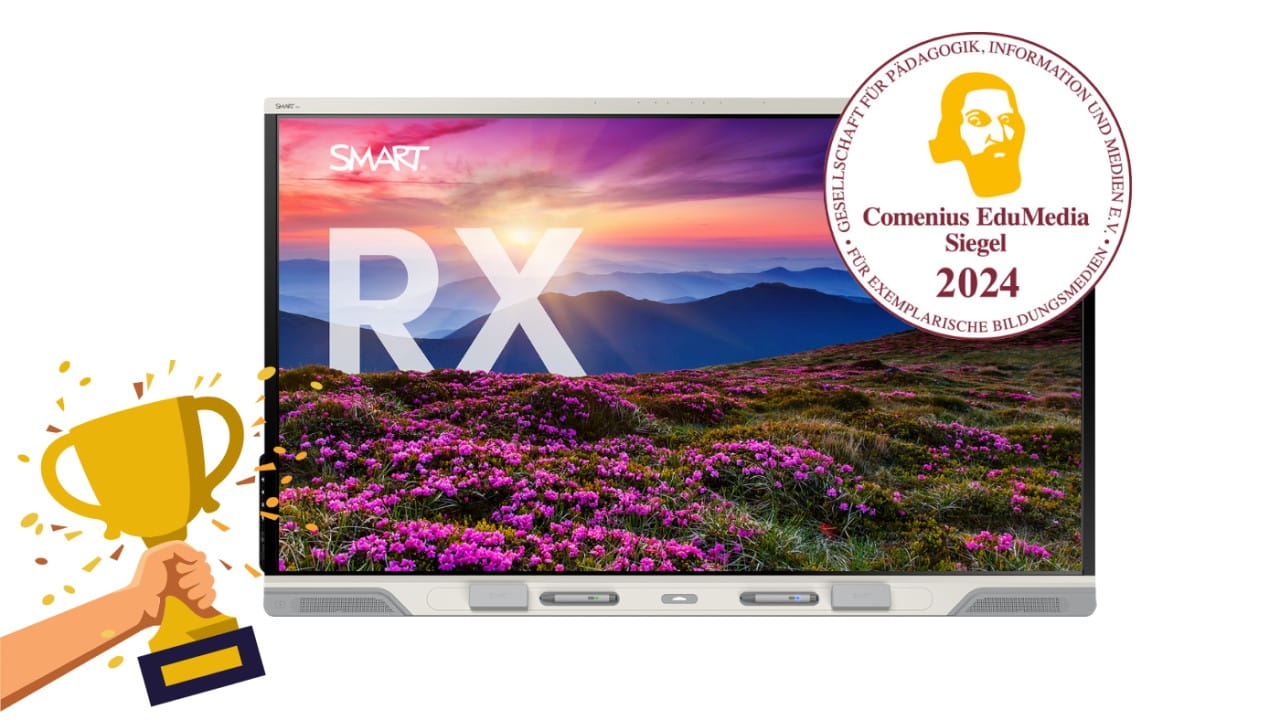Award-winning SMART Board RX displaying a stunning mountain sunset scene, decorated with the Comenius EduMedia Siegel 2024 for educational excellence.