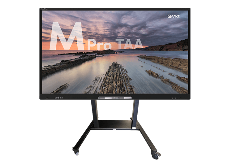 TAA-compliant SMART Board M Pro series interactive display on an FSE-420 mobile stand with a scenic background.